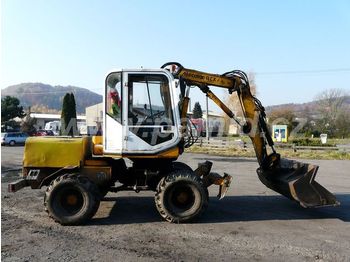 MECALAC 11CX - Máy xúc bánh lốp