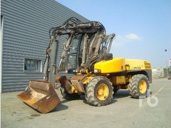 Mecalac 12MSX - Máy xúc bánh lốp