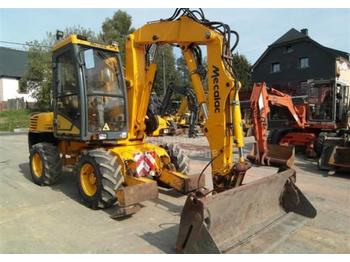 Mecalac 12 MX - Máy xúc bánh lốp