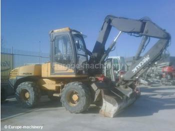 Mecalac 14 MBX - Máy xúc bánh lốp