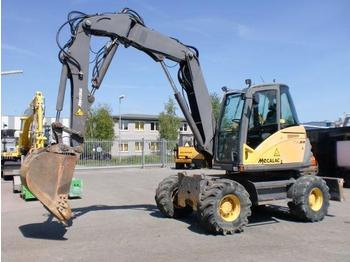 Mecalac 714MW 4x4x4 - Máy xúc bánh lốp