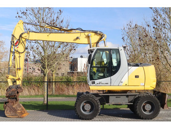 Máy xúc bánh lốp NEW HOLLAND MH CITY