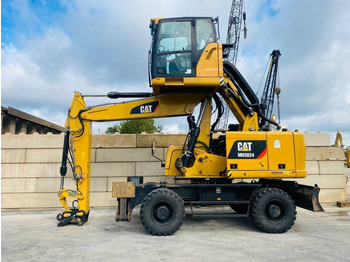Máy cạp rác/ Công nghiệp CATERPILLAR MH3024