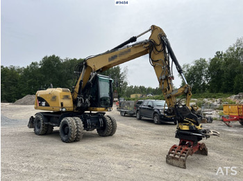 Máy xúc bánh lốp CATERPILLAR M313D