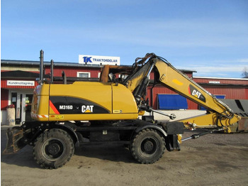 Máy xúc bánh lốp CATERPILLAR M316D