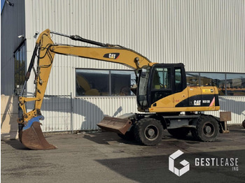 Máy xúc bánh lốp CATERPILLAR M313D