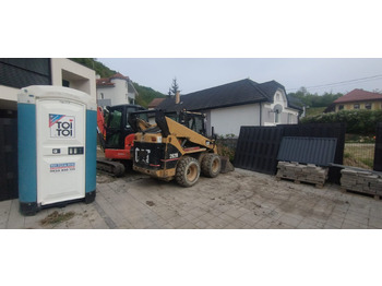 Máy xúc lật đa năng CATERPILLAR