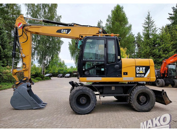 Máy xúc bánh lốp CATERPILLAR M313D