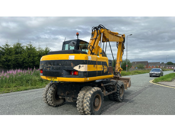 Máy xúc bánh lốp JCB: hình 4