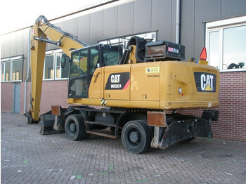 Máy cạp rác/ Công nghiệp Caterpillar MH3024: hình 2