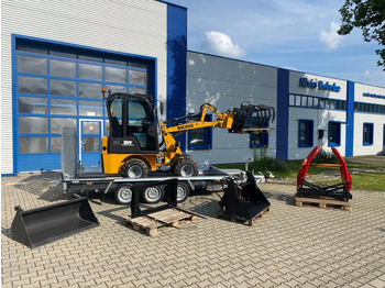 Máy xúc lật mini gấp khúc PERKINS