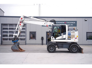 Máy xúc bánh lốp KOMATSU PW148-11