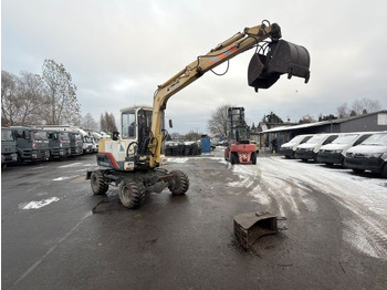 Máy xúc bánh lốp YANMAR