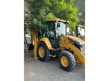 Máy xúc trước múc sau CATERPILLAR