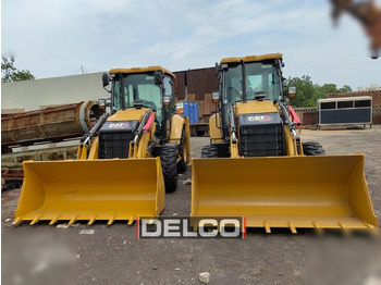 Máy xúc trước múc sau CATERPILLAR