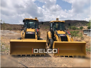 Máy xúc trước múc sau CATERPILLAR