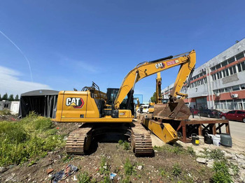 Máy xúc bánh xích CATERPILLAR 323