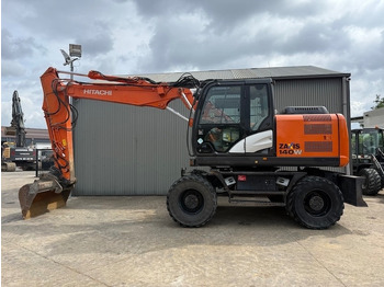 Máy xúc bánh lốp HITACHI ZX140W-5