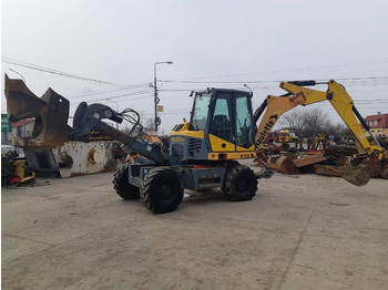 Máy xúc lật bánh lốp kính thiên văn HAULOTTE