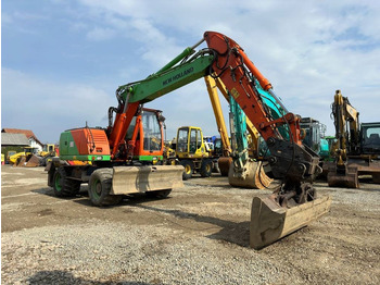 Máy xúc bánh lốp New Holland MH Plus: hình 3 Máy xúc bánh lốp New Holland MH Plus: hình 3