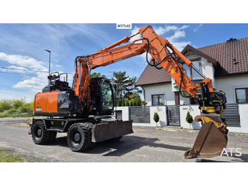 Máy xúc bánh lốp HITACHI ZX140W-6
