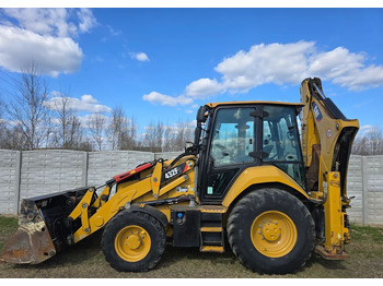 Máy xúc trước múc sau Caterpillar: hình 4