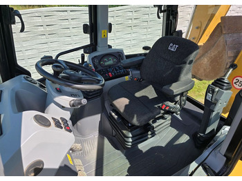 Máy xúc trước múc sau Caterpillar: hình 3