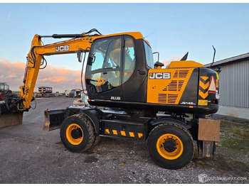 Máy xúc bánh lốp JCB JS145W