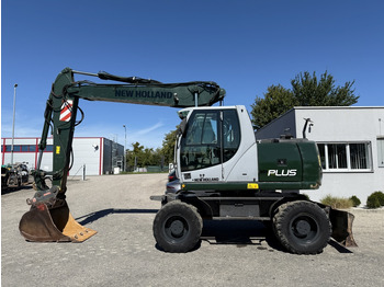 Máy xúc bánh lốp NEW HOLLAND