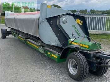 Đính kèm máy gặt đập thức ăn gia súc
