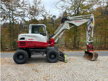 Máy xúc bánh lốp TAKEUCHI TB 295 W: hình 2