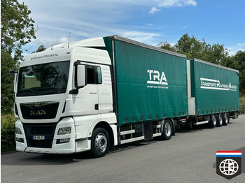 Xe tải thùng mui bạt MAN TGX 18.440