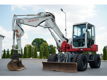 Máy xúc bánh lốp TAKEUCHI