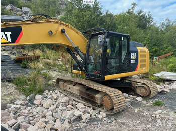 Máy xúc bánh xích CATERPILLAR 323