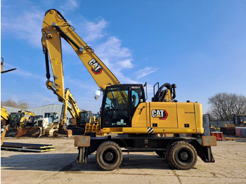 Máy xúc bánh lốp CATERPILLAR MH3024
