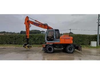 Máy xúc bánh lốp NEW HOLLAND