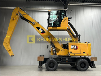 Máy cạp rác/ Công nghiệp CATERPILLAR MH3024