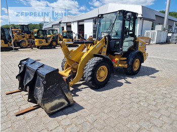 Máy xúc lật bánh lốp CATERPILLAR