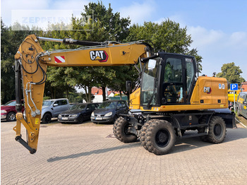 Máy xúc bánh lốp CATERPILLAR M318