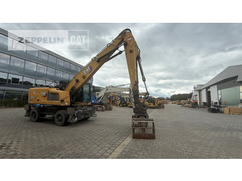 Máy cạp rác/ Công nghiệp CATERPILLAR MH3022