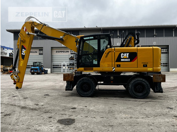 Máy cạp rác/ Công nghiệp CATERPILLAR MH3022