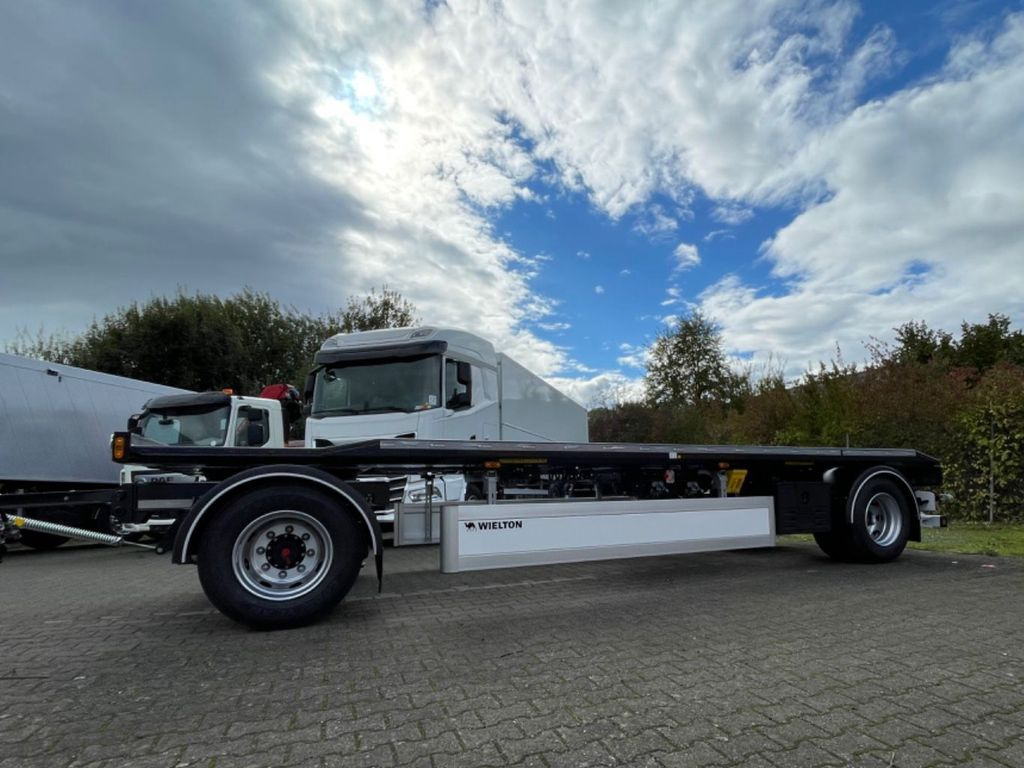 Wielton 2-Achs Außenroller-Abrollanhänger Wielton 2-Achs Außenroller-Abrollanhänger - Rơ moóc thùng chứa: hình 2 Wielton 2-Achs Außenroller-Abrollanhänger Wielton 2-Achs Außenroller-Abrollanhänger - Rơ moóc thùng chứa: hình 2