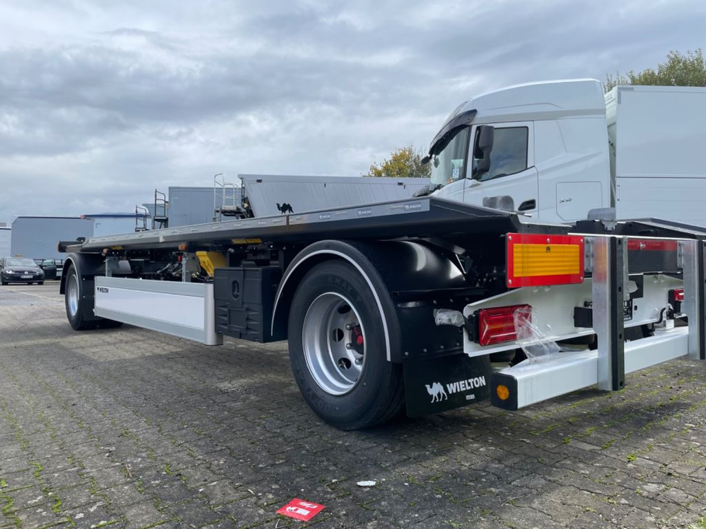 Wielton 2-Achs Außenroller-Abrollanhänger Wielton 2-Achs Außenroller-Abrollanhänger - Rơ moóc thùng chứa: hình 3 Wielton 2-Achs Außenroller-Abrollanhänger Wielton 2-Achs Außenroller-Abrollanhänger - Rơ moóc thùng chứa: hình 3