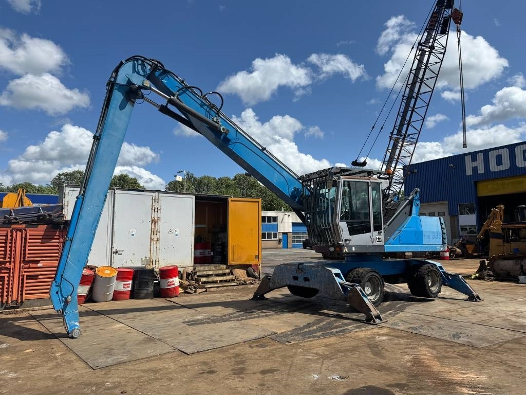 Fuchs MHL 335 - Máy cạp rác/ Công nghiệp: hình 2 Fuchs MHL 335 - Máy cạp rác/ Công nghiệp: hình 2