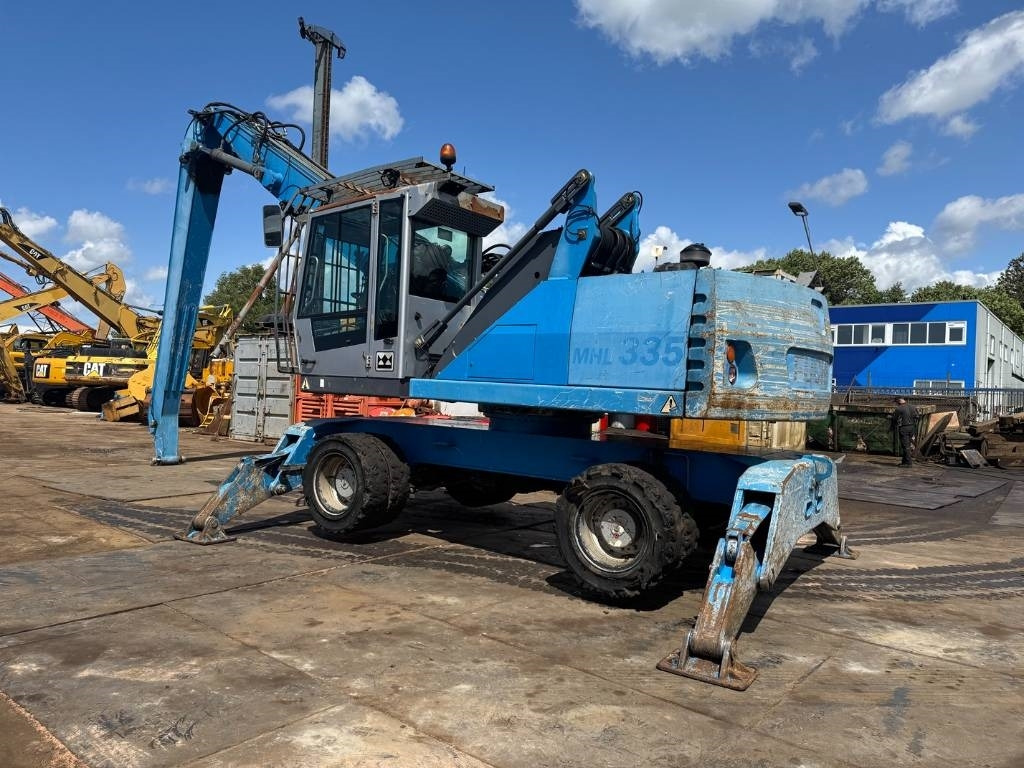 Fuchs MHL 335 - Máy cạp rác/ Công nghiệp: hình 3 Fuchs MHL 335 - Máy cạp rác/ Công nghiệp: hình 3