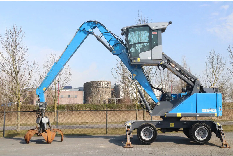 Fuchs MHL 320 | PEEL GRAB | UMSCHLAG | GOOD TIRES - Máy cạp rác/ Công nghiệp: hình 1 Fuchs MHL 320 | PEEL GRAB | UMSCHLAG | GOOD TIRES - Máy cạp rác/ Công nghiệp: hình 1