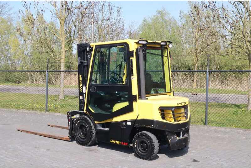 Hyster H2.5 A | BOOM SUSPENSION | SIDESHIFT | FORK EXTENTIONS | FORK POSITIONERS - Xe nâng diesel: hình 3 Hyster H2.5 A | BOOM SUSPENSION | SIDESHIFT | FORK EXTENTIONS | FORK POSITIONERS - Xe nâng diesel: hình 3
