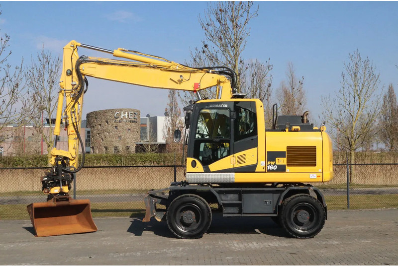 Komatsu PW160-11 | ENGCON TILTROTATOR | BUCKET | TRAILER HYDR. - Máy xúc bánh lốp: hình 1 Komatsu PW160-11 | ENGCON TILTROTATOR | BUCKET | TRAILER HYDR. - Máy xúc bánh lốp: hình 1