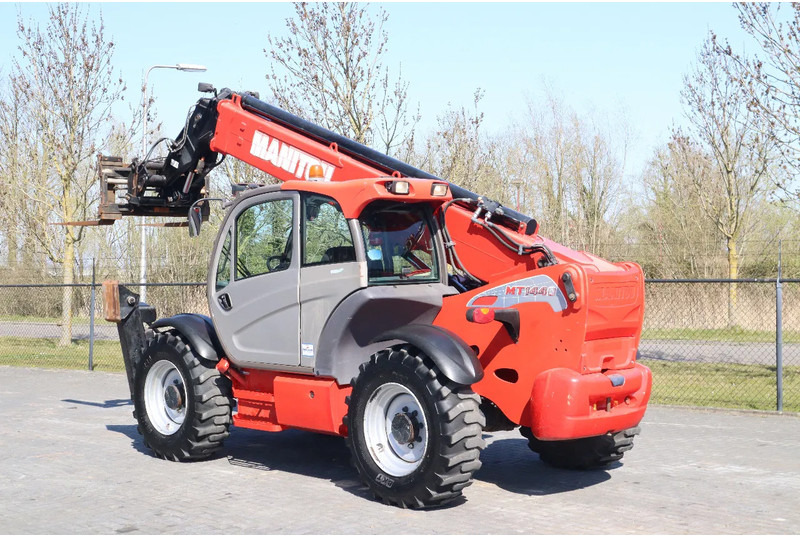 Manitou MT 1440 EASY | AIRCO | HYDR. FORKS - Xe nhấc hình viễn vọng kính: hình 3 Manitou MT 1440 EASY | AIRCO | HYDR. FORKS - Xe nhấc hình viễn vọng kính: hình 3