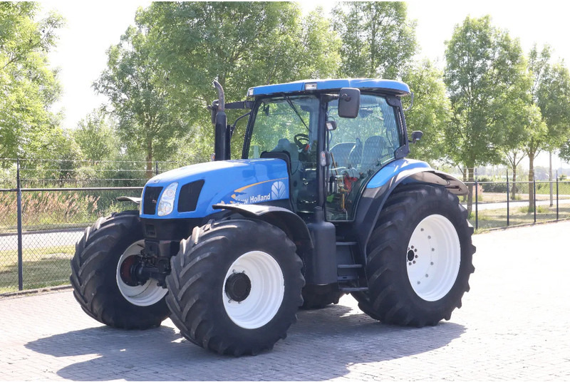 New Holland TS135A | 40 KM/H | 4X4 | SUPERSTEER - Máy cày: hình 2 New Holland TS135A | 40 KM/H | 4X4 | SUPERSTEER - Máy cày: hình 2